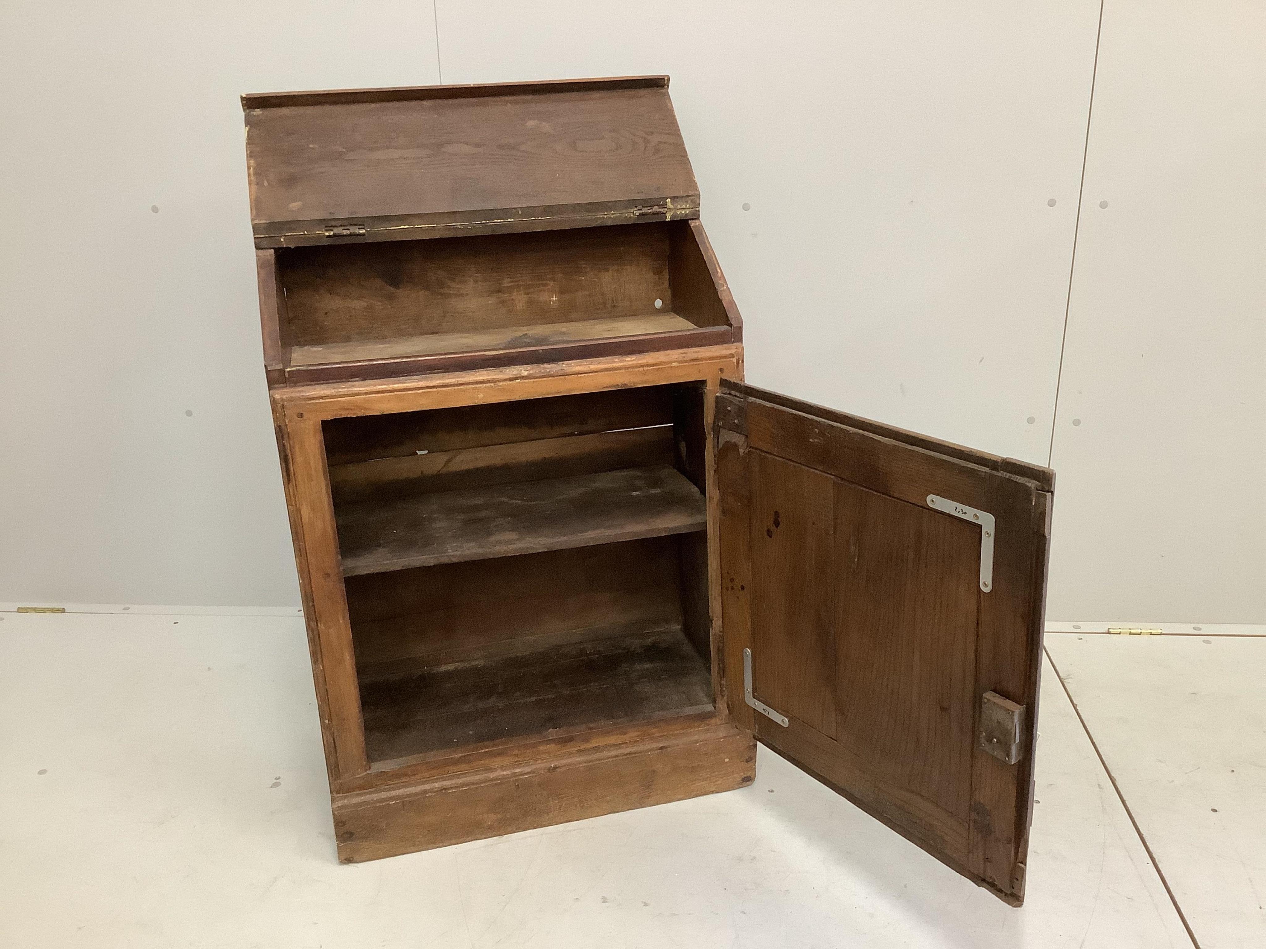 A small 19th century Continental oak and fruitwood bureau, width 70cm, depth 35cm, height 95cm. Condition - fair